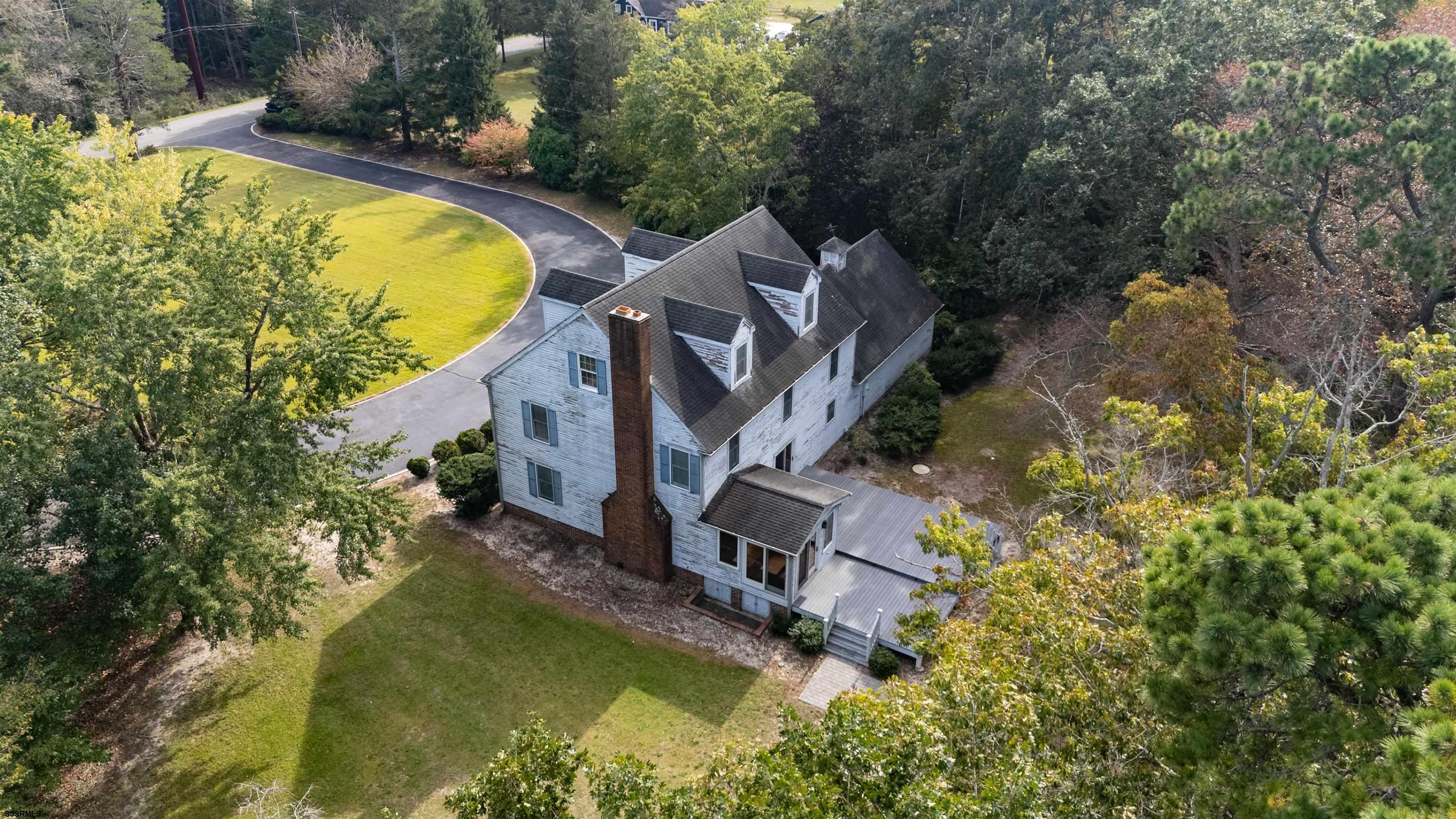 216 Riverside Drive Port Republic, NJ 08241 - Photo 39 of 47 an aerial view of a house with swimming pool and large trees