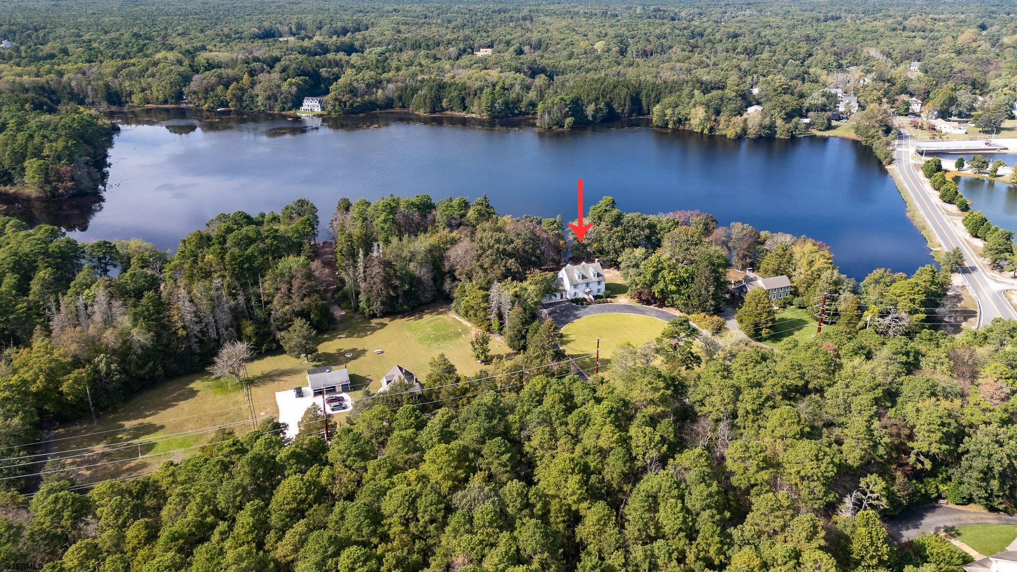 216 Riverside Drive Port Republic, NJ 08241 - Photo 40 of 47 an aerial view of a house with a yard and lake view