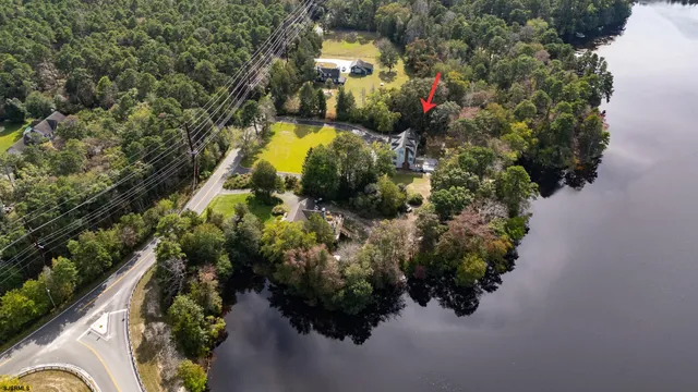 a view of a house with a flower garden