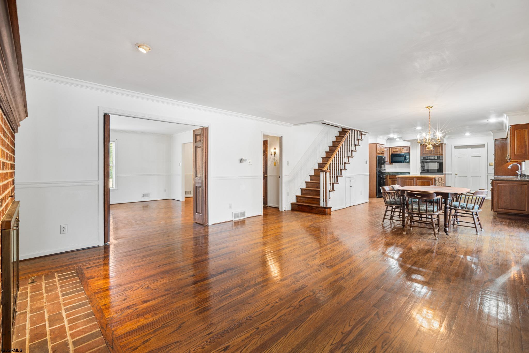 216 Riverside Drive Port Republic, NJ 08241 - Photo 7 of 47 a view of kitchen with furniture and wooden floor