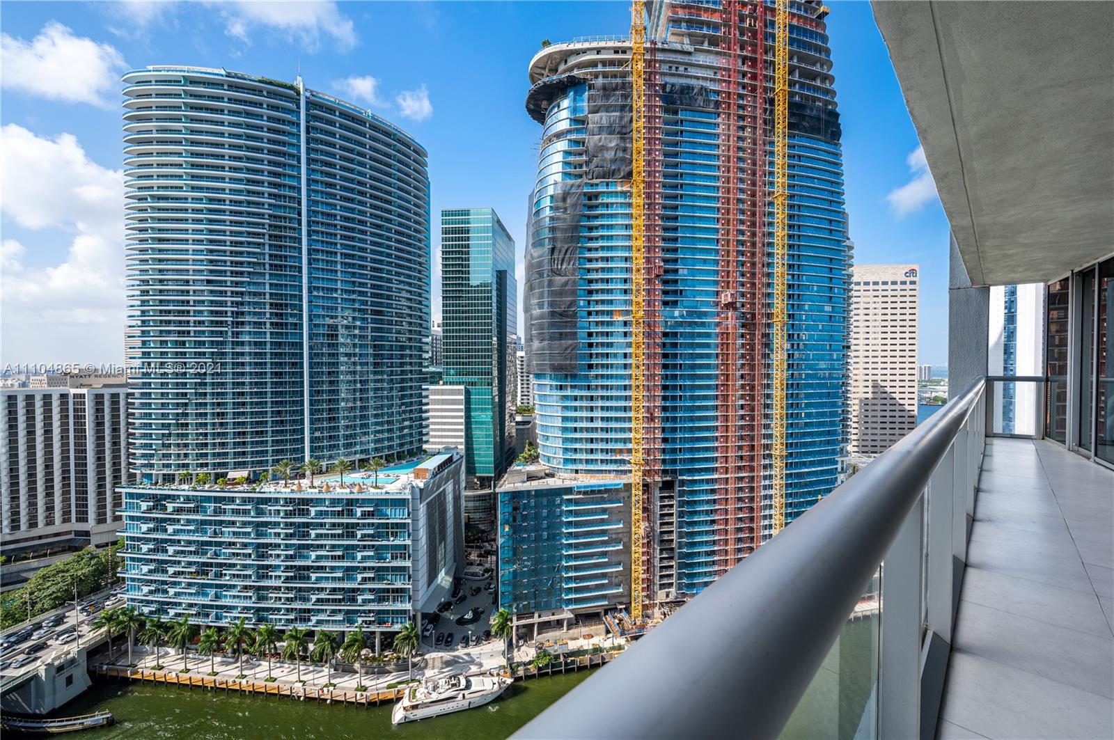 465 Brickell Avenue, Unit 2702 Miami, FL 33131 - Photo 3 of 37 a view of a balcony with a potted plant