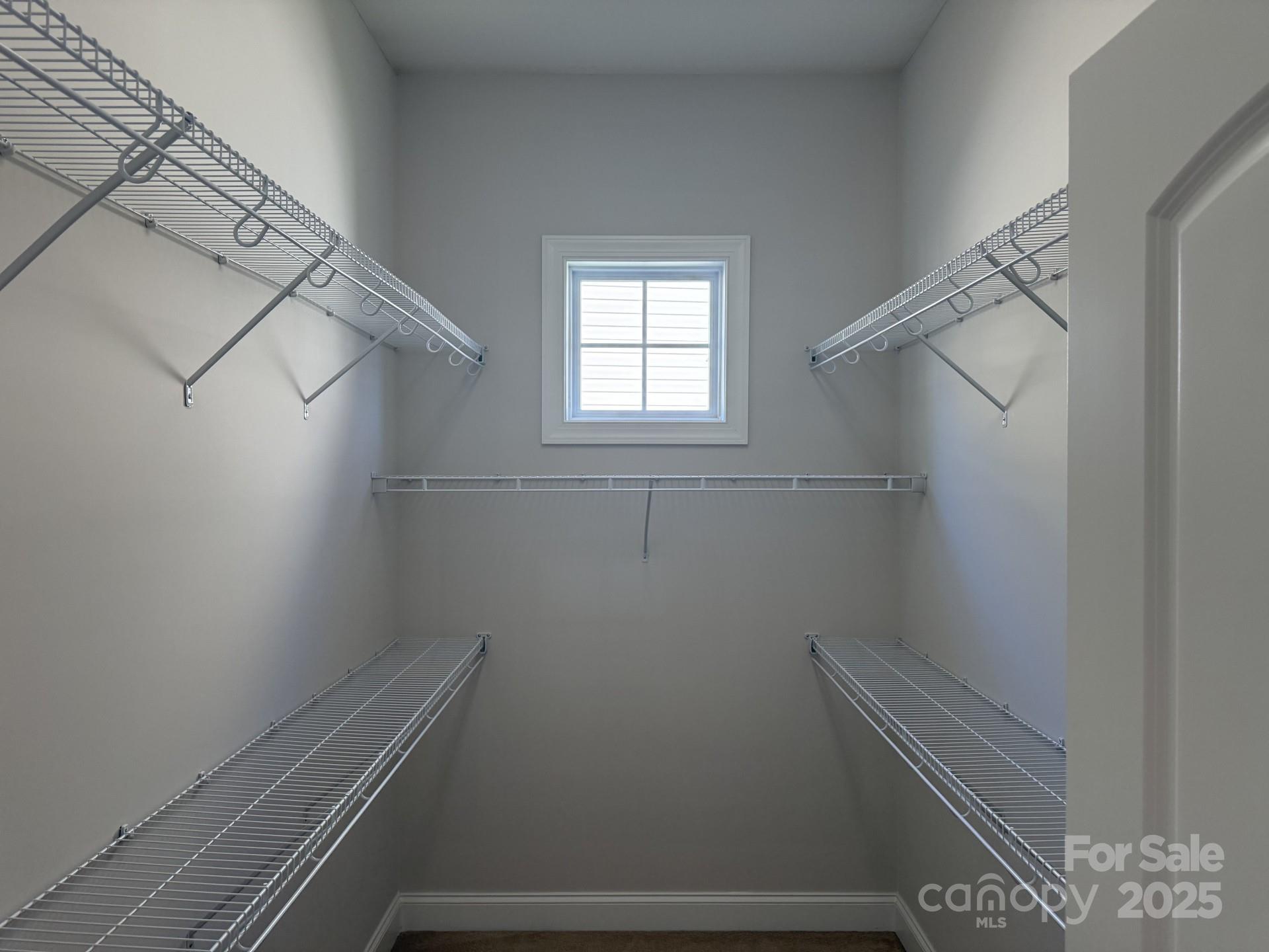 18 Eagle Pointe Way Flat Rock, NC 28731 - Photo 21 of 33 a bathroom with a window and shower