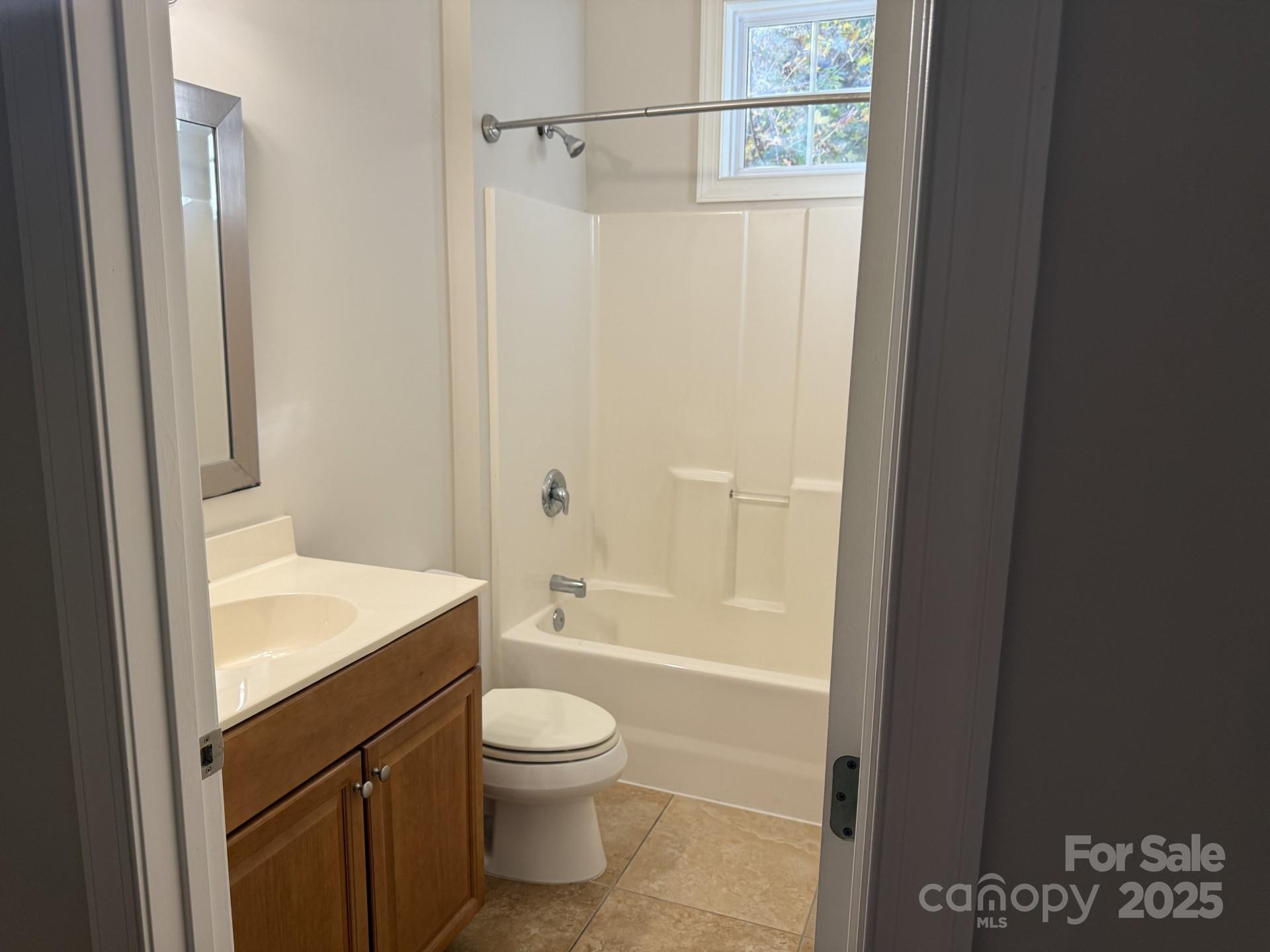 18 Eagle Pointe Way Flat Rock, NC 28731 - Photo 30 of 33 a bathroom with a sink a toilet and shower