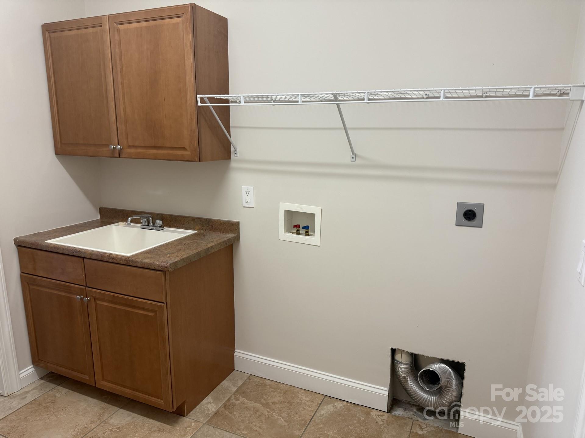 18 Eagle Pointe Way Flat Rock, NC 28731 - Photo 32 of 33 a utility room with dryer and washer