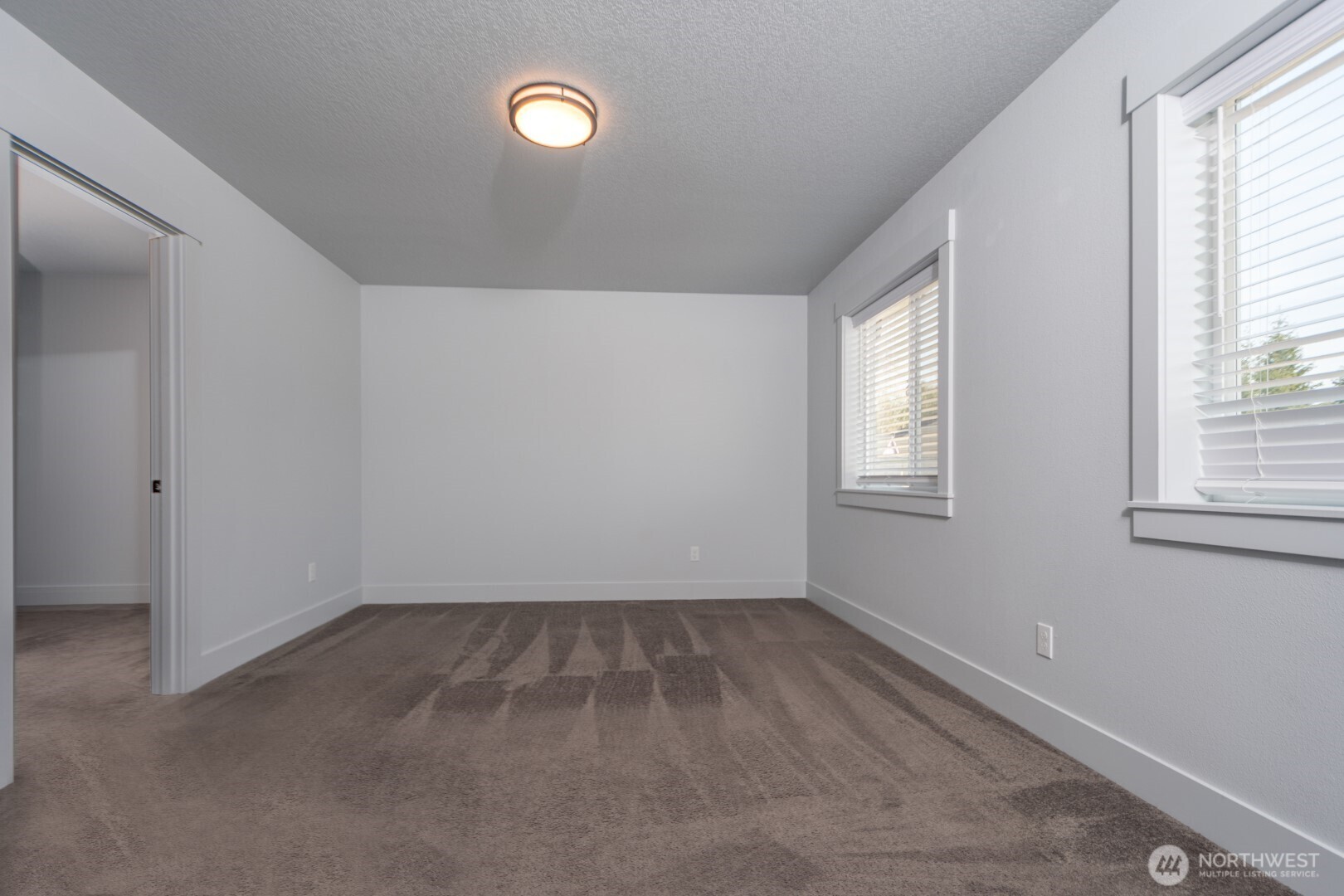 206 Oak Street Winlock, WA 98596 - Photo 6 of 21 an empty room with a window