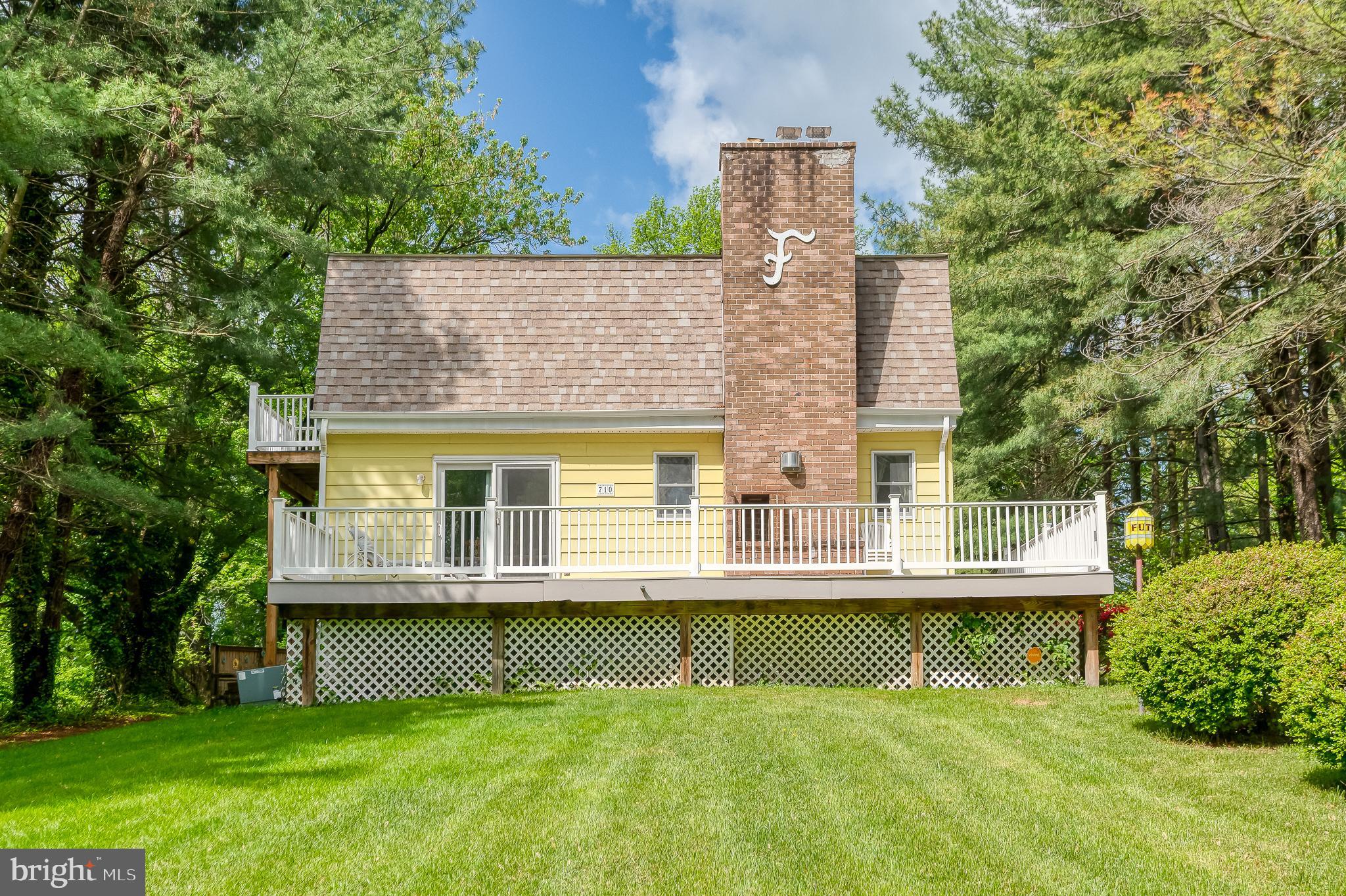 710 Magnolia Road Joppa, MD 21085 - Photo 1 of 58 front view of a house with a yard