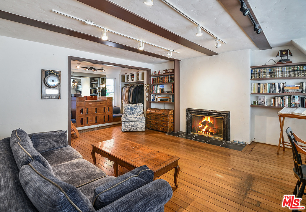 1038 Palisades Beach Road Santa Monica, CA 90403 - Photo 12 of 18 a living room with furniture and a fireplace
