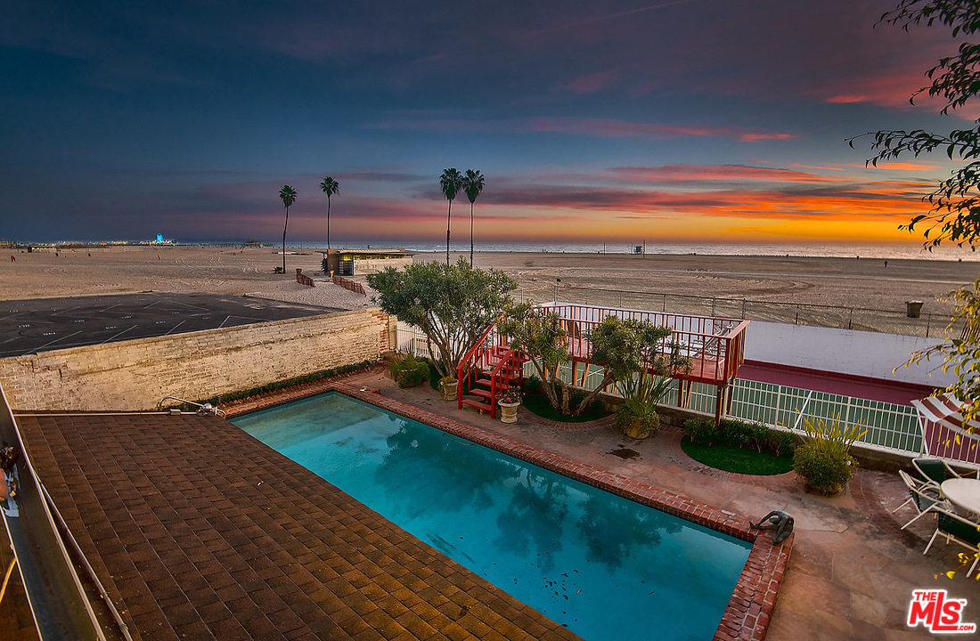 1038 Palisades Beach Road Santa Monica, CA 90403 - Photo 15 of 18 a view of a swimming pool with a lounge chair
