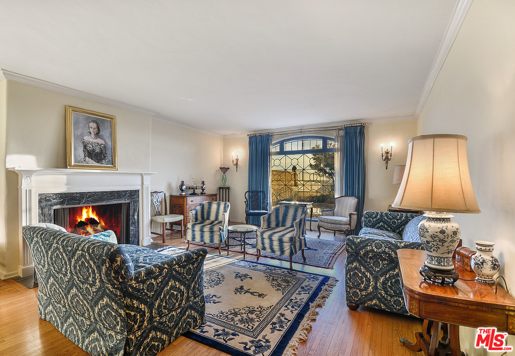 1038 Palisades Beach Road Santa Monica, CA 90403 - Photo 5 of 18 a living room with furniture and a fireplace
