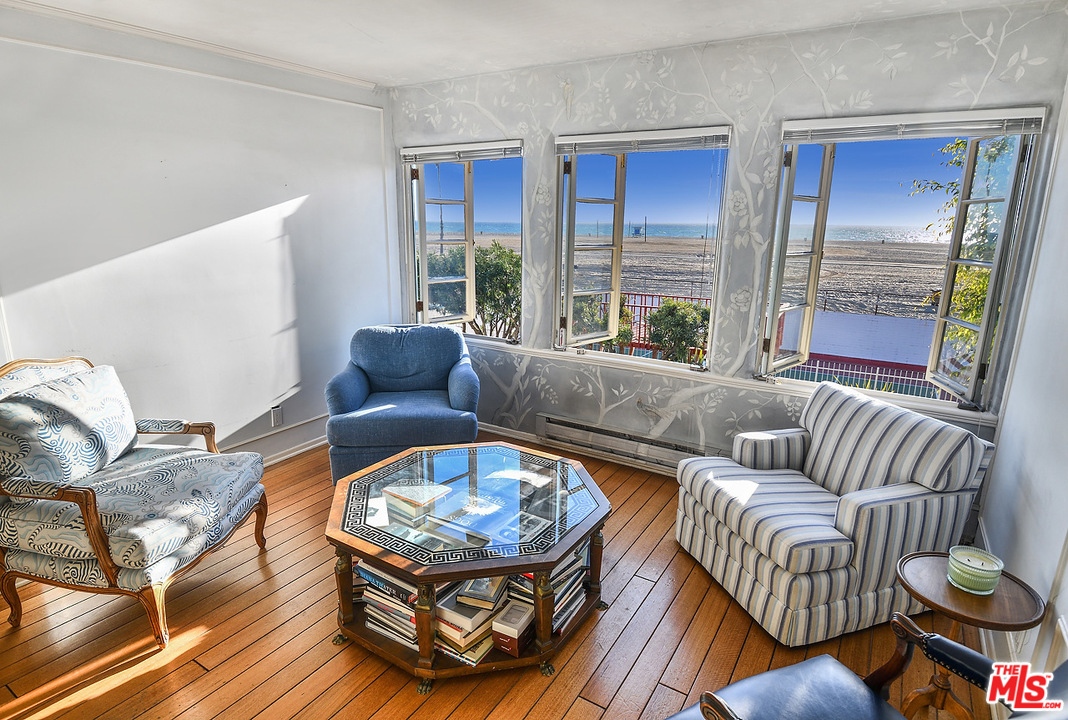 1038 Palisades Beach Road Santa Monica, CA 90403 - Photo 10 of 18 a living room with furniture and a large window