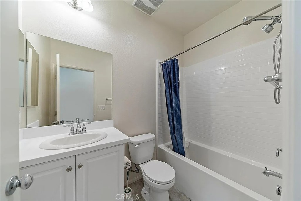 7364 Solstice Place Rancho Cucamonga, CA 91739 - Photo 12 of 19 a bathroom with a sink a toilet and shower
