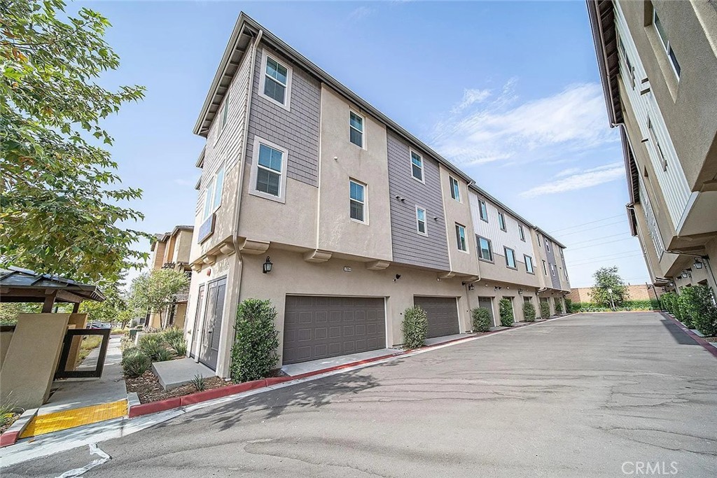7364 Solstice Place Rancho Cucamonga, CA 91739 - Photo 19 of 19 a front view of a building with street