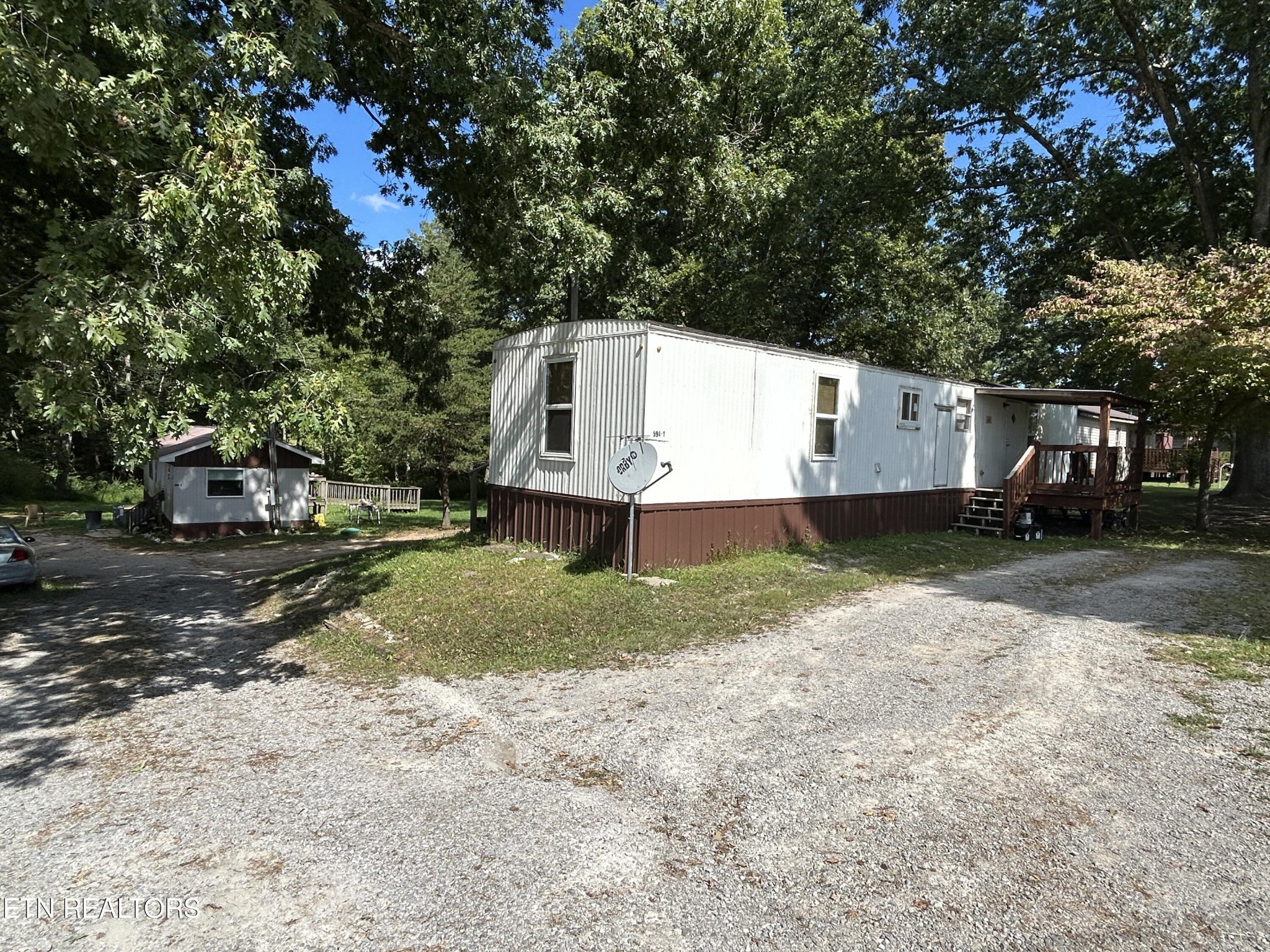 594 Fairgrounds Road Jamestown, TN 38556 - Photo 3 of 3 a view of a house with a yard