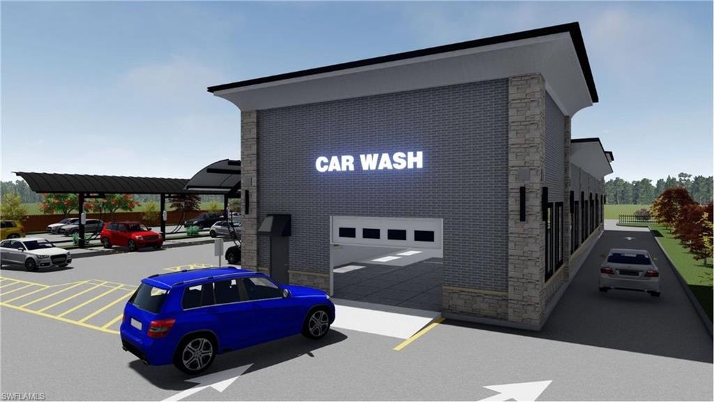 11760 Tamiami Trail East Naples, FL 34113 - Photo 2 of 5 a view of car parked in front of a house