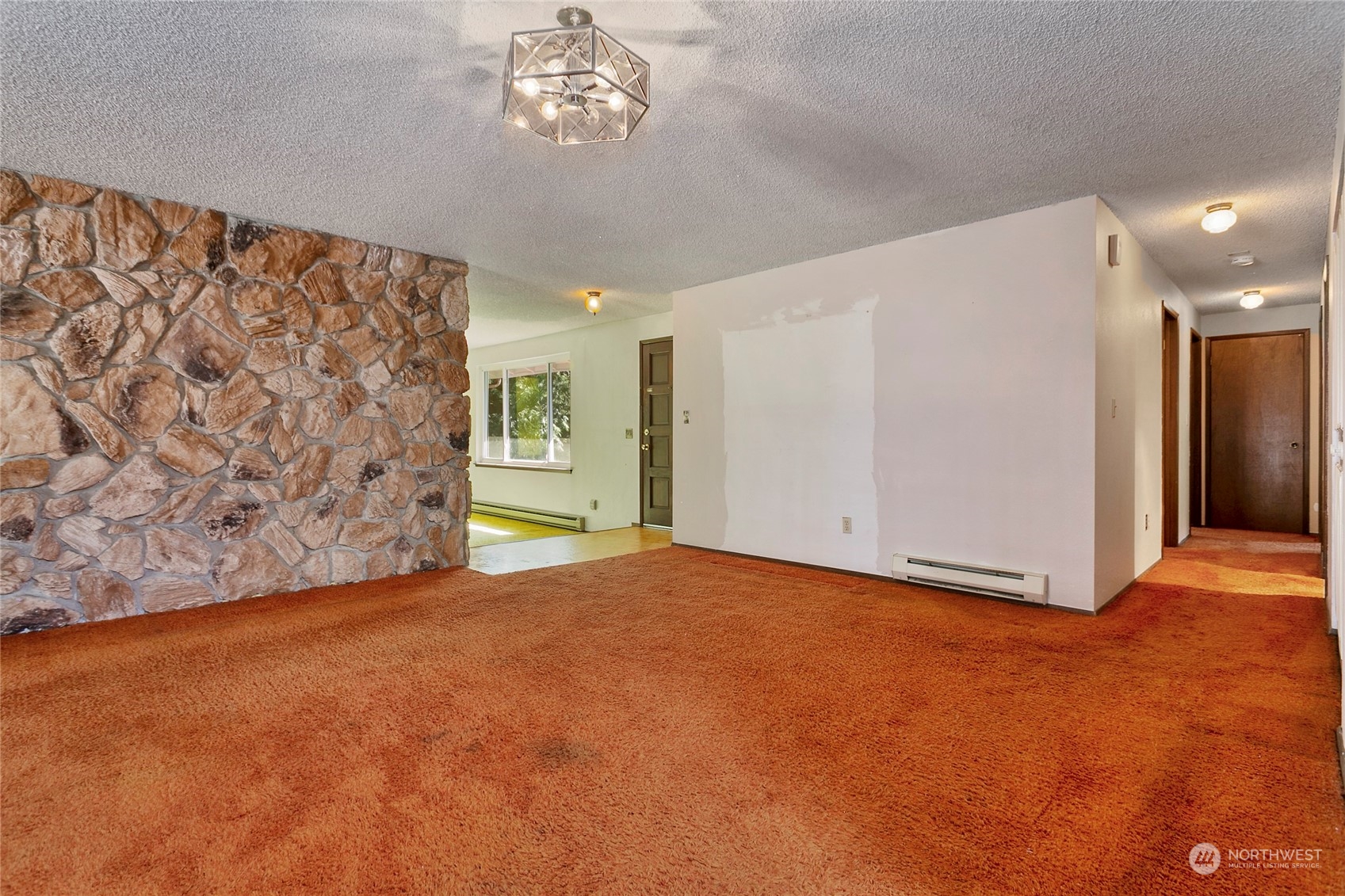 1024 Shaw Road Ferndale, WA 98248 - Photo 8 of 40 a view of an empty room with a chandelier