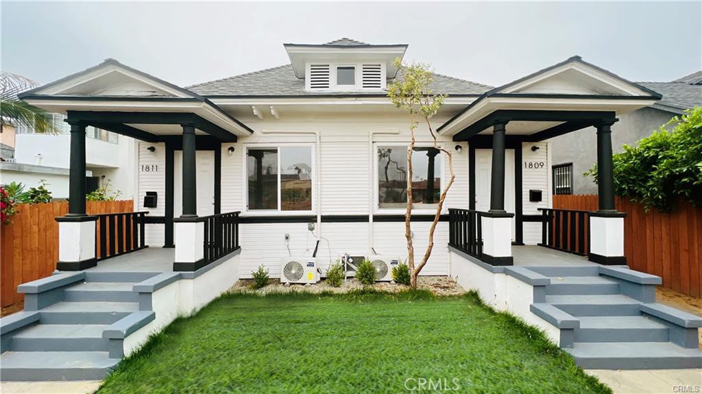 1809 West 35th Street Los Angeles, CA 90018 - Photo 1 of 1 a view of a house with deck and garden