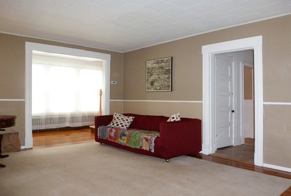 38 Lyndale Street Springfield, MA 01108 - Photo 3 of 25 a living room with furniture and a window