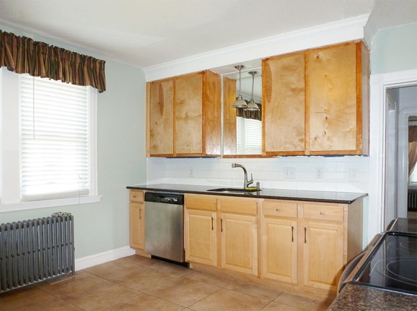 38 Lyndale Street Springfield, MA 01108 - Photo 9 of 25 a kitchen with a sink and cabinets