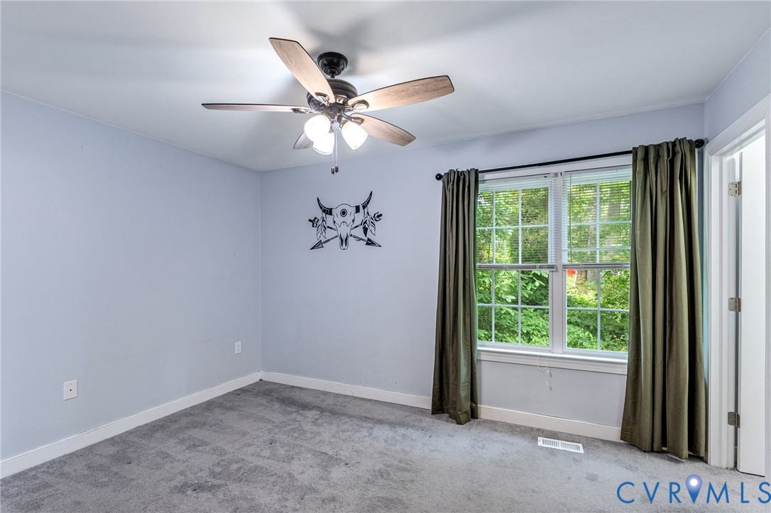 6338 Oak Drive Quinton, VA 23141 - Photo 14 of 25 a view of an empty room with a window