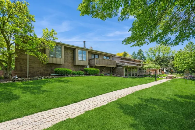 a view of a house with a garden