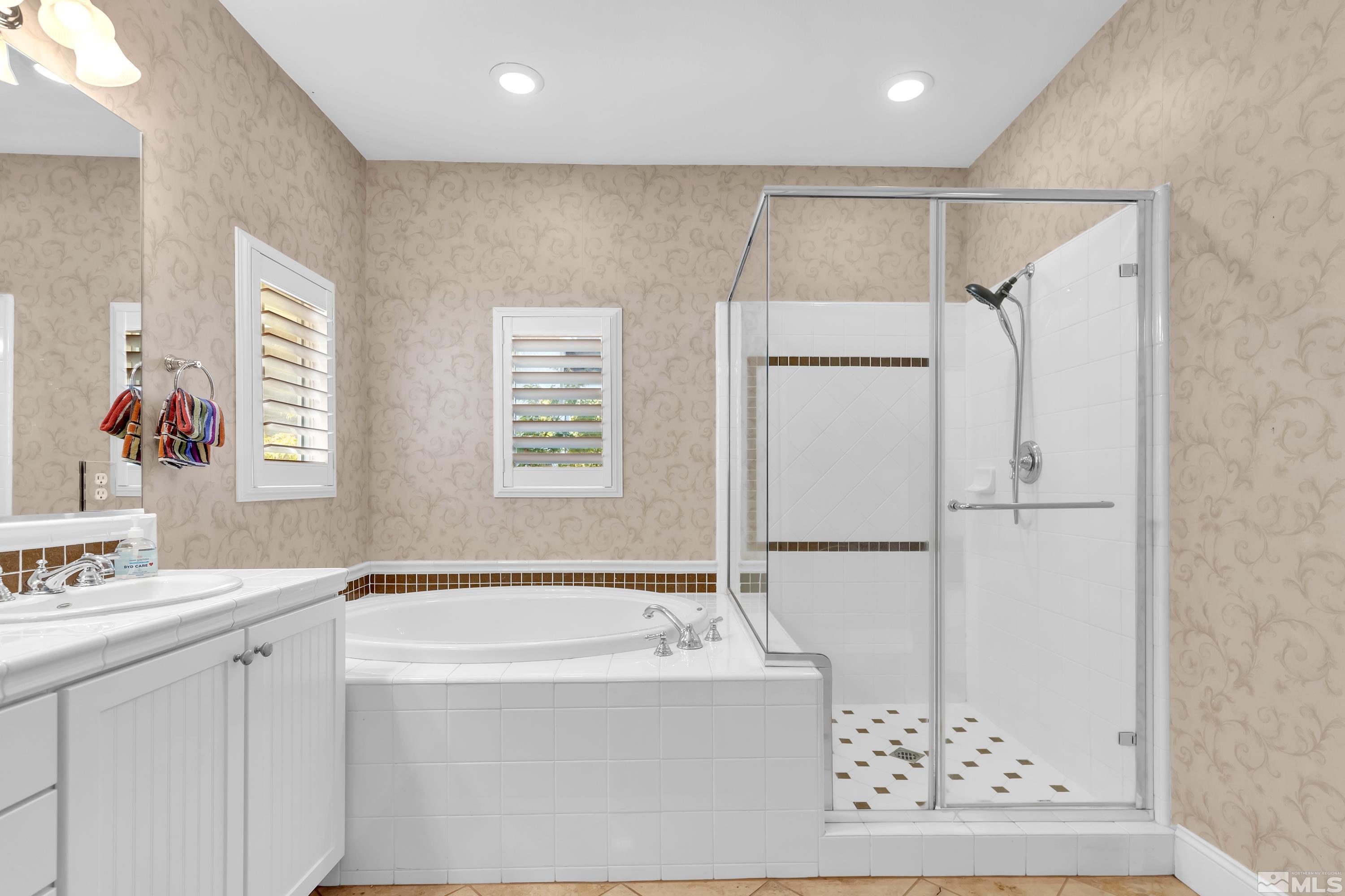 1410 Waterloo Drive Reno, NV 89509 - Photo 28 of 37 a bathroom with a bathtub and a sink