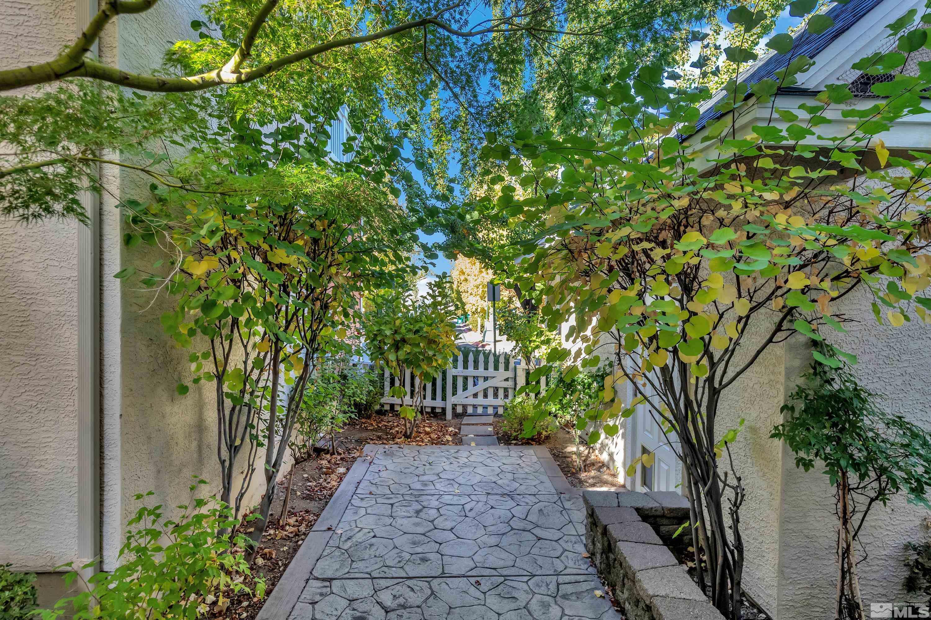 1410 Waterloo Drive Reno, NV 89509 - Photo 33 of 37 a pathway of a house with garden