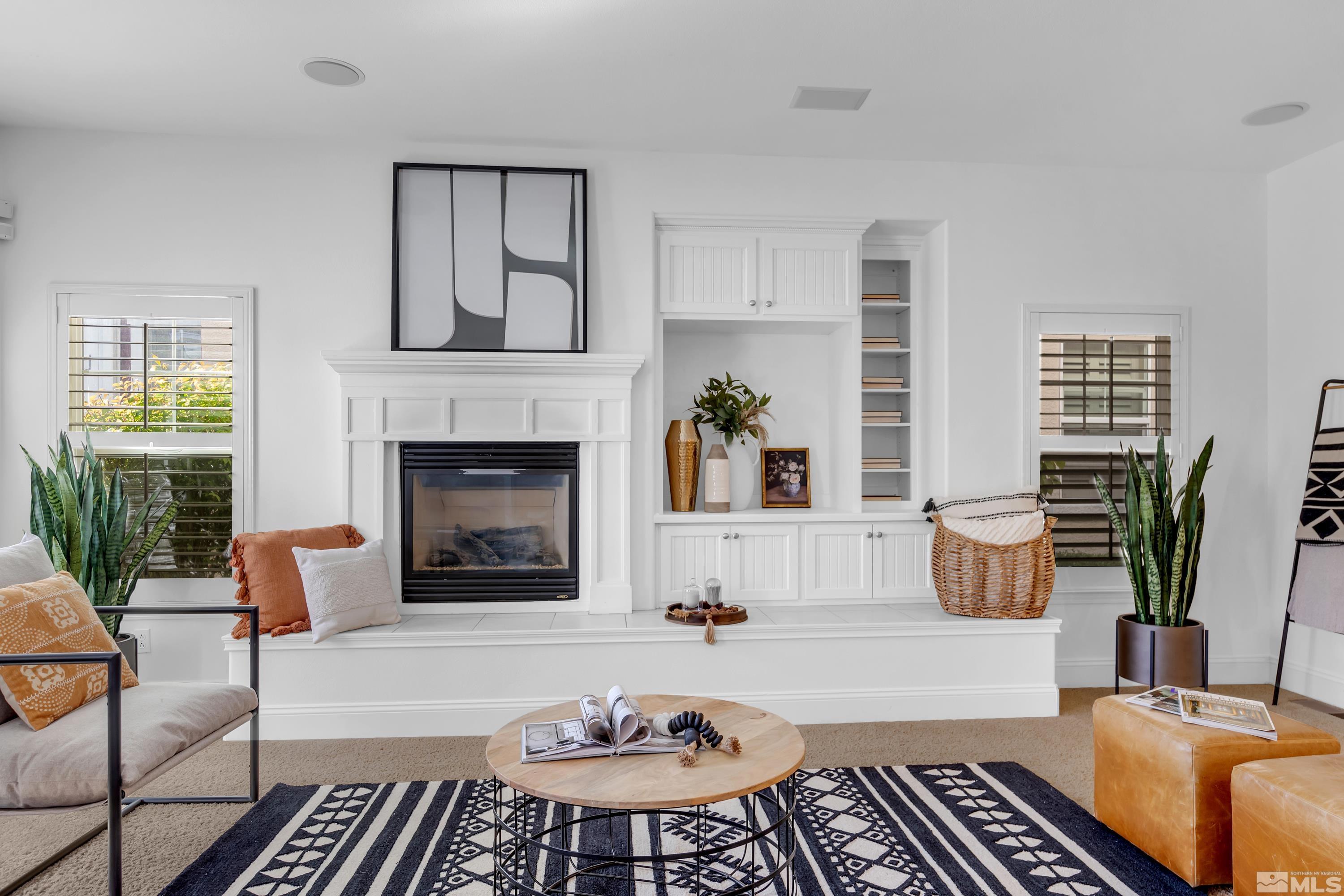 1410 Waterloo Drive Reno, NV 89509 - Photo 6 of 37 a living room with furniture and a fireplace