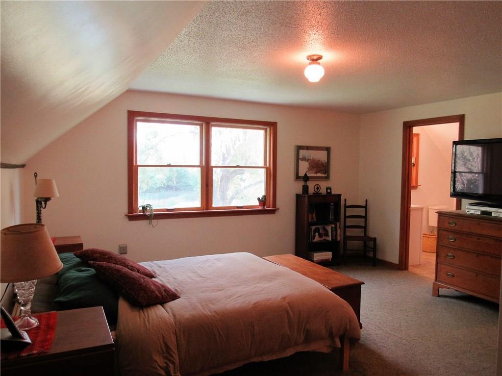 357 Kendall Corner Road Belfast, ME 04915 - Photo 21 of 35 Large master bedroom with en-suite...