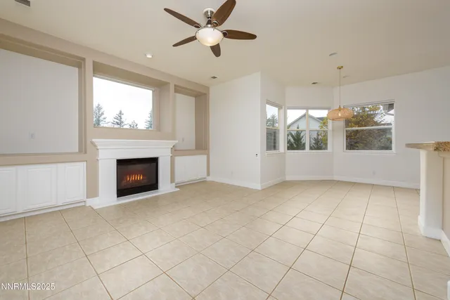 a view of a kitchen with a sink and microwave