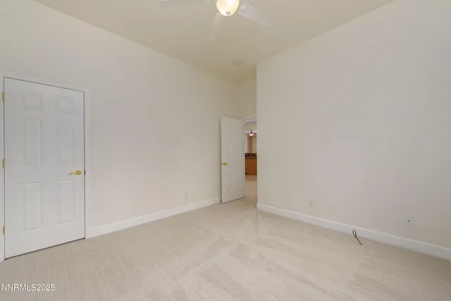a view of a hallway with closet