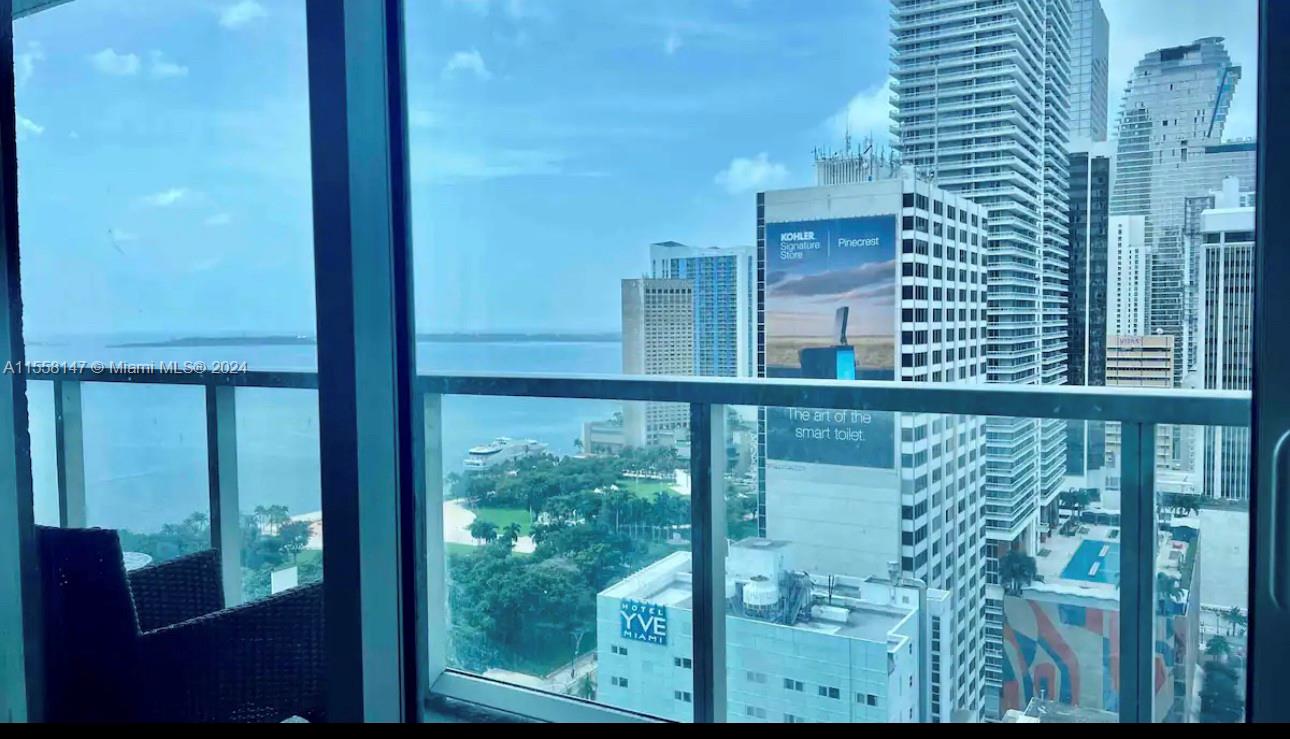 a view of tall glass windows