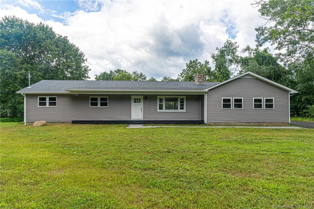 305 Riggs Street Oxford, CT 06478 - Photo 1 of 1 a house view with a garden space
