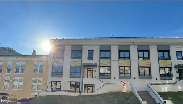 front view of building with a street