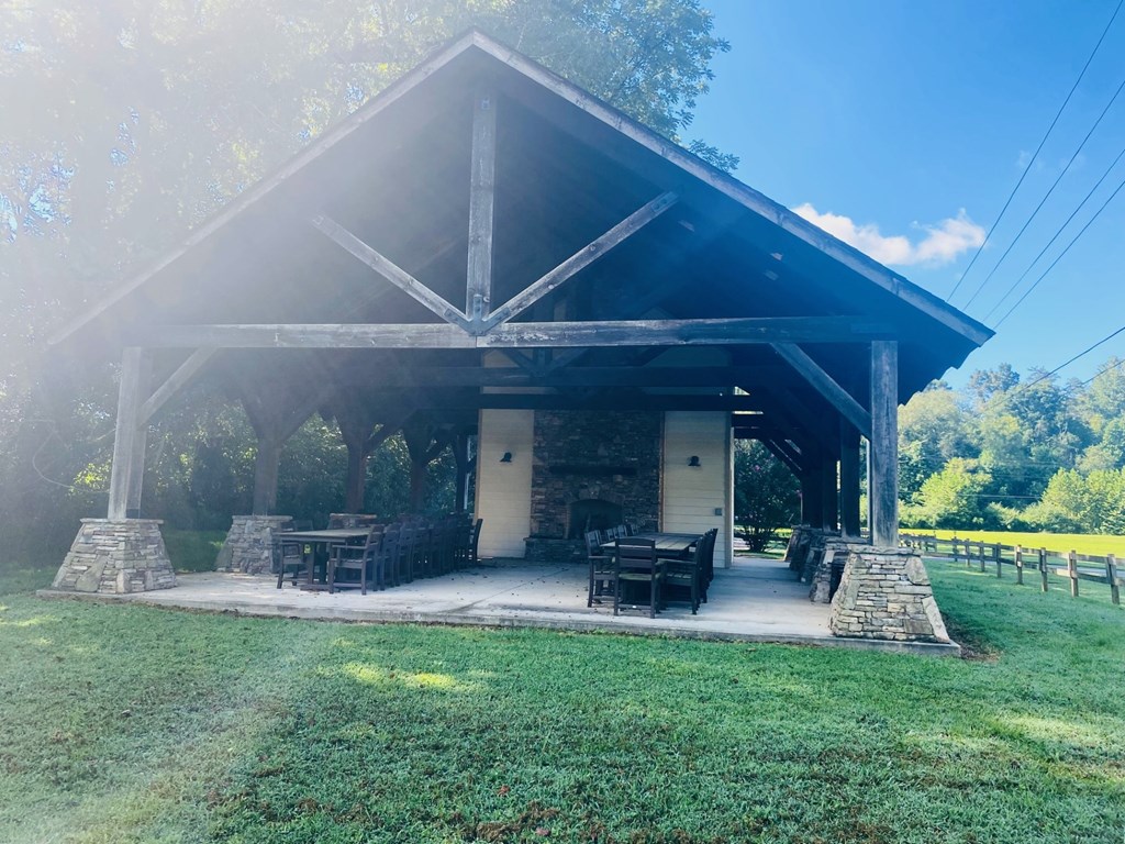 Lot 89 River Mountain Road Murphy, NC 28906 - Photo 14 of 17 a view of a porch with furniture and garden