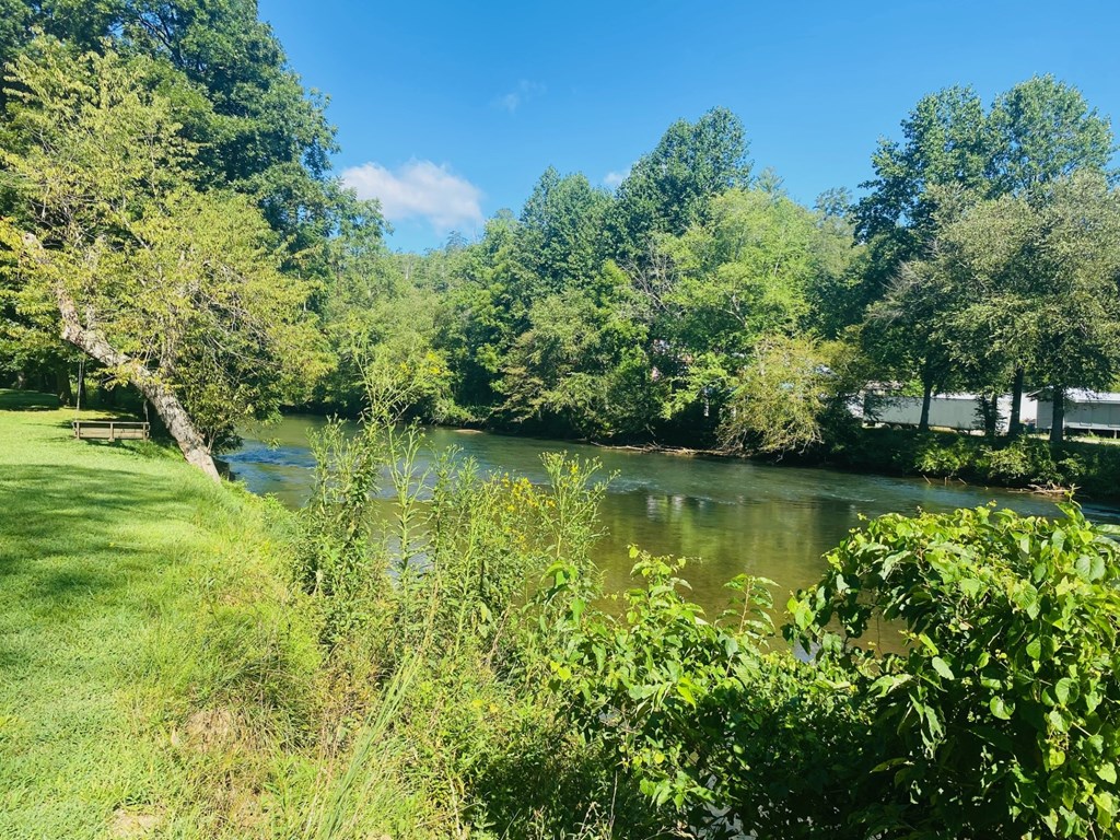 Lot 89 River Mountain Road Murphy, NC 28906 - Photo 16 of 17 a view of a lake with a yard
