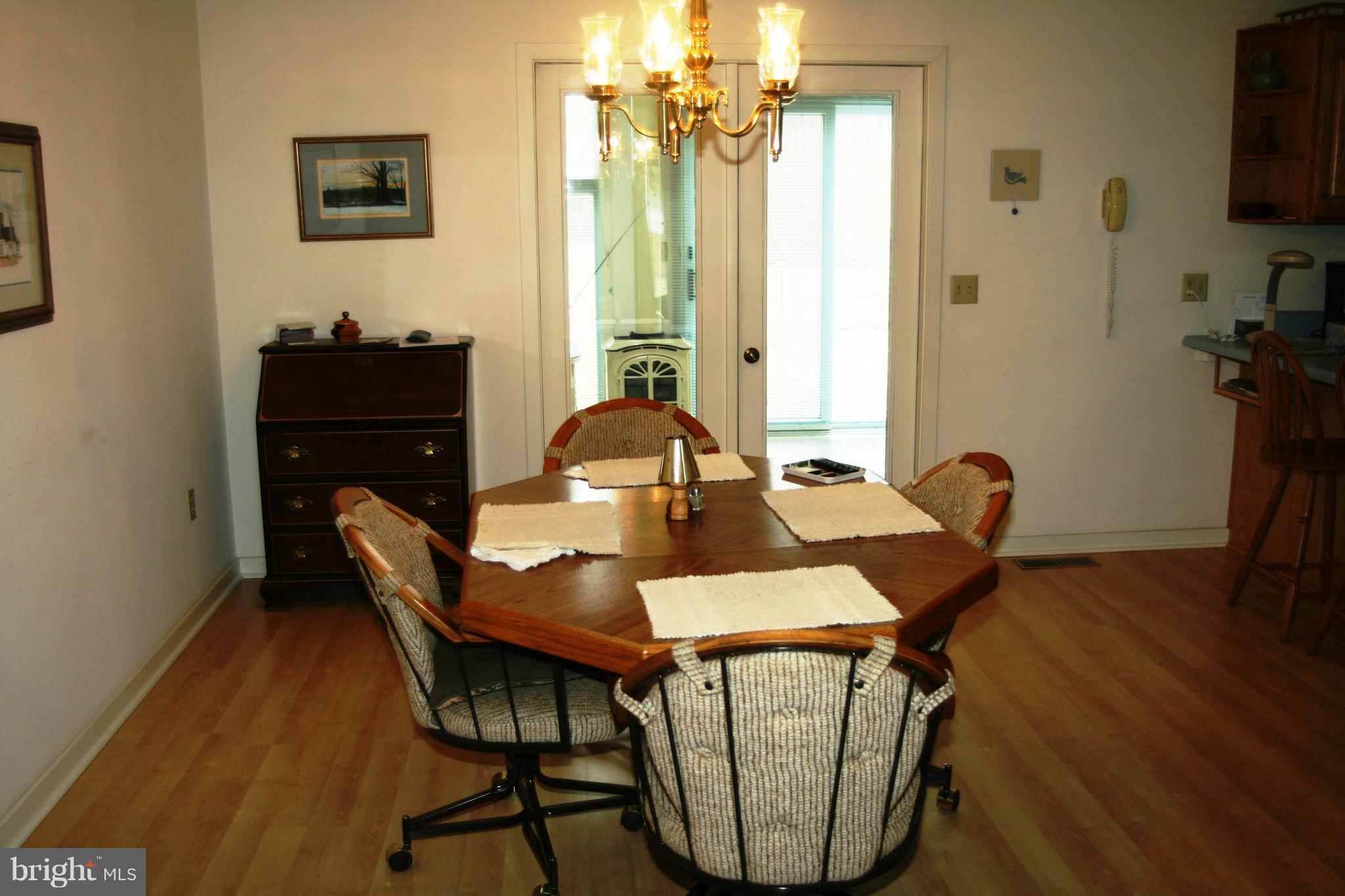 8560 Camp Road Chestertown, MD 21620 - Photo 4 of 17 . With views of the sun porch and back yard nature