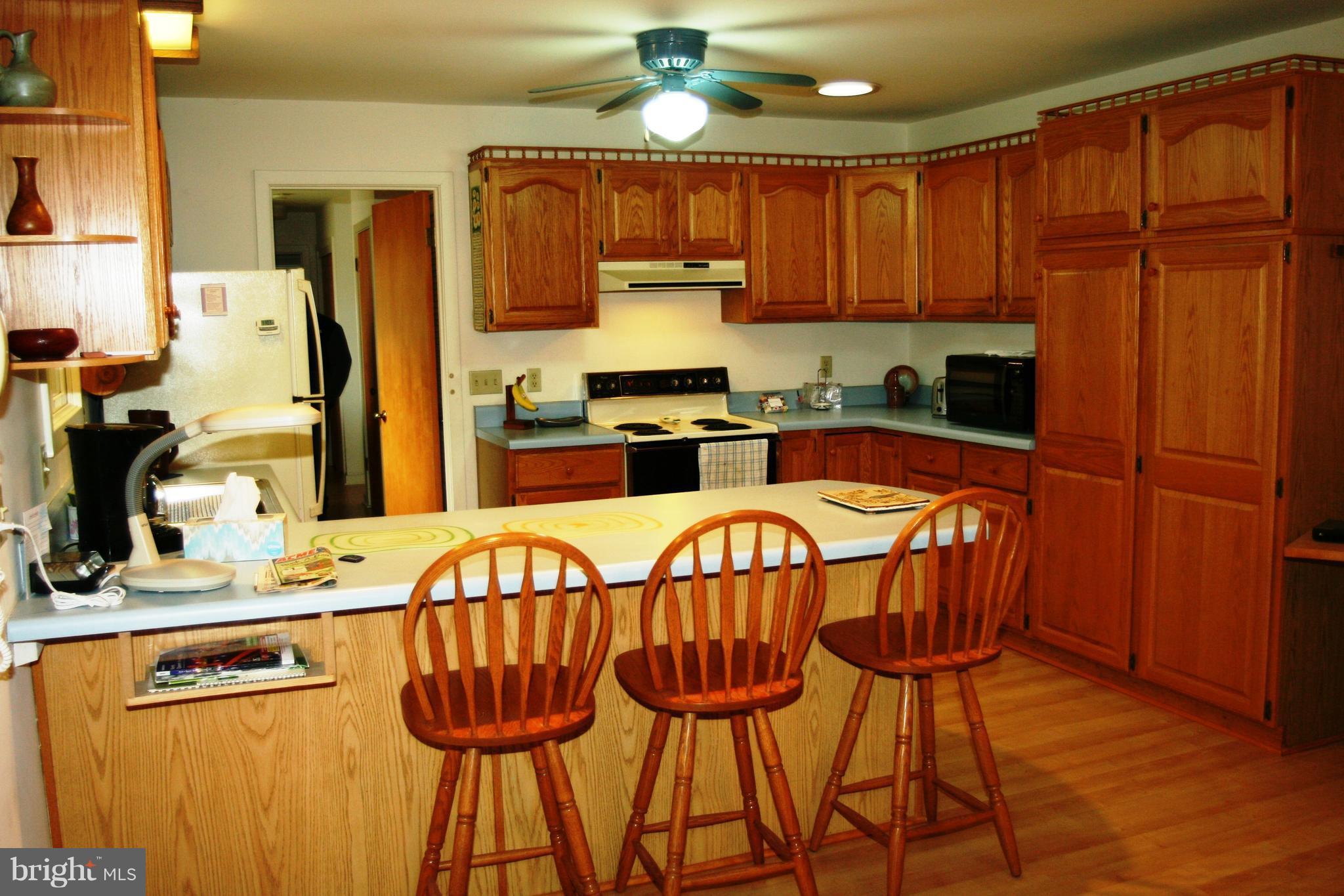 8560 Camp Road Chestertown, MD 21620 - Photo 7 of 17 Beautiful hardwood cabinets.