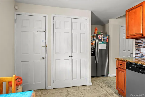 a view of kitchen and utility room
