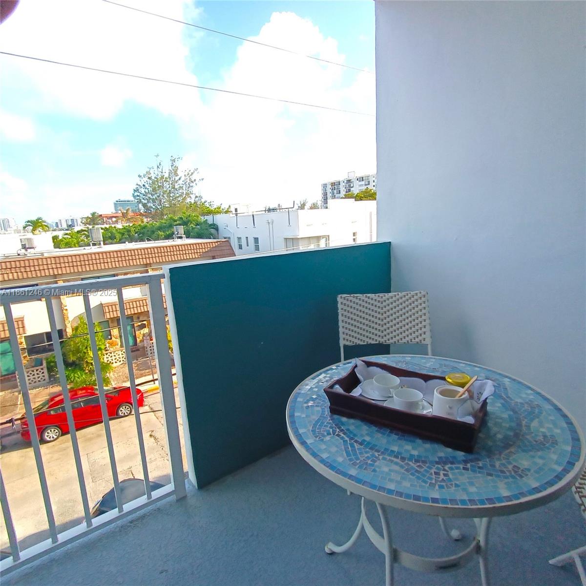 8000 Harding Avenue, Unit 3B Miami Beach, FL 33141 - Photo 2 of 30 a view of a dining room with furniture window and wooden floor