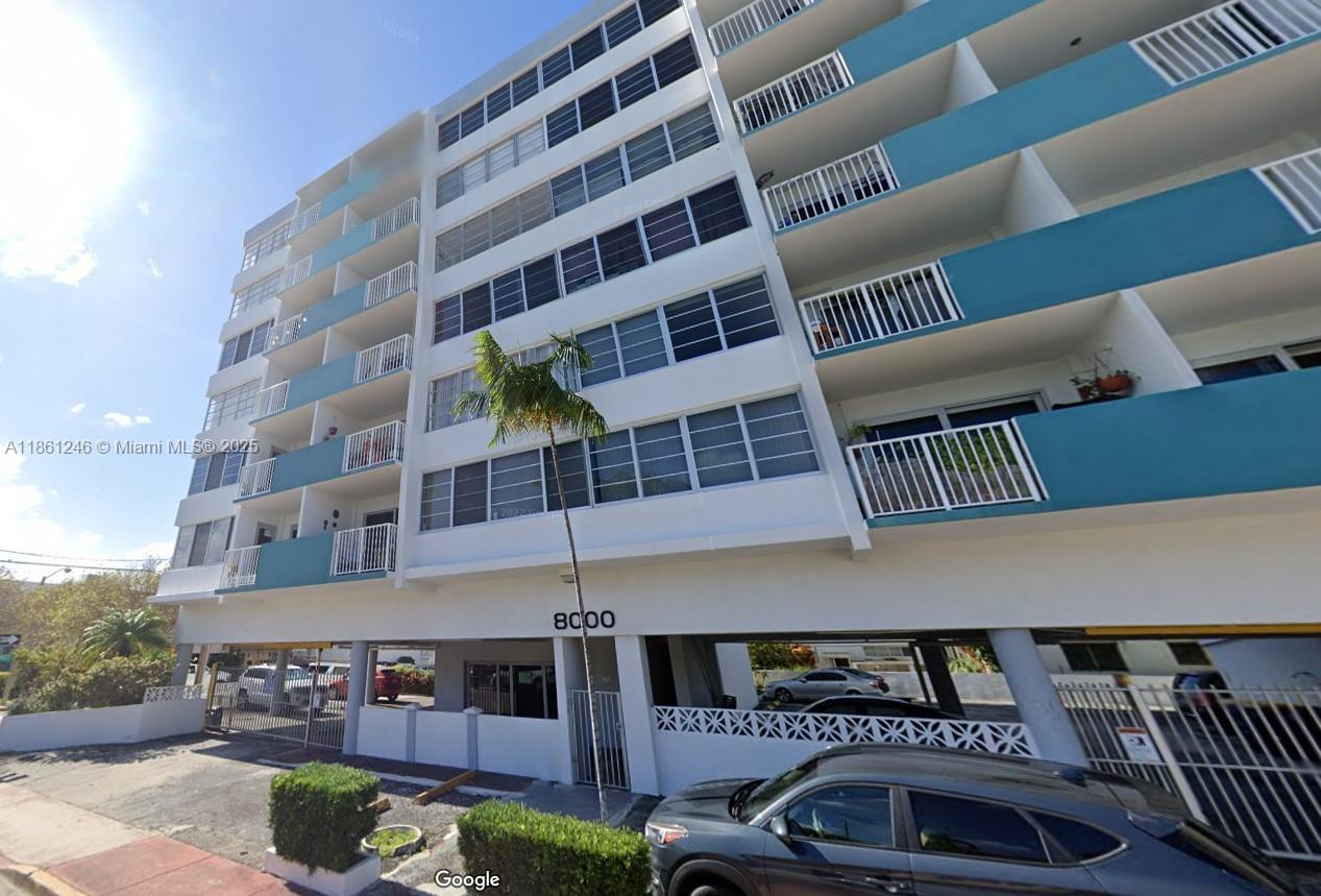 8000 Harding Avenue, Unit 3B Miami Beach, FL 33141 - Photo 4 of 30 a front view of building with outdoor seating