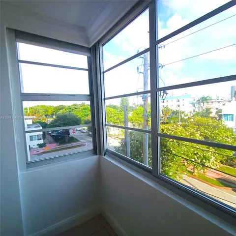 a view of a glass door with a view from window