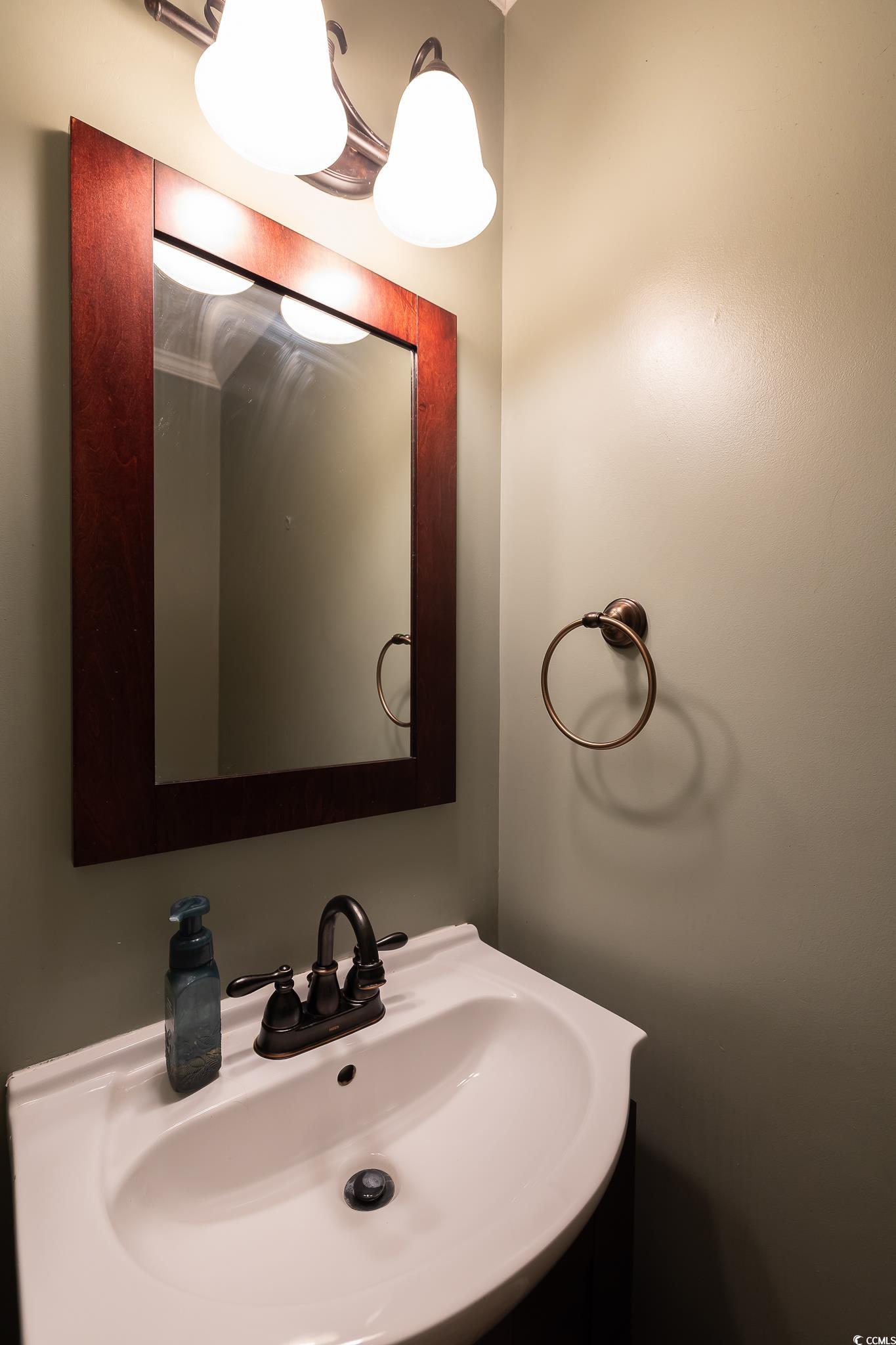 620 15th Avenue South, Unit 89 Surfside Beach, SC 29575 - Photo 2 of 14 Bathroom featuring vanity