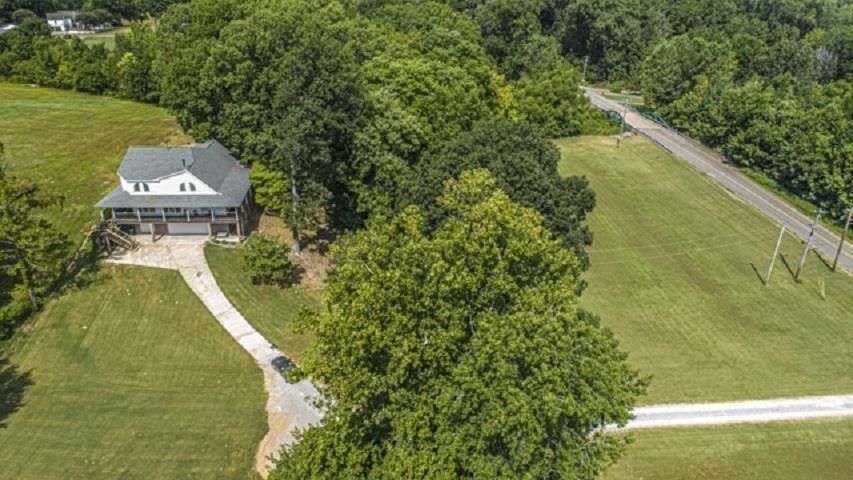 3155 Bass Road Millington, TN 38053 - Photo 3 of 25 Secluded behind the trees, you don't even see the home from the road.
