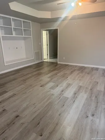 a kitchen with a sink cabinets and stainless steel appliances