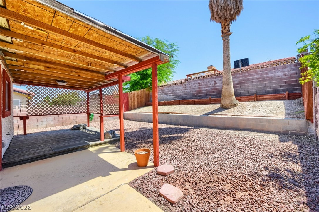 2322 Sabroso Street Las Vegas, NV 89156 - Photo 13 of 17 A private rear yard offers a covered patio and desert landscape.