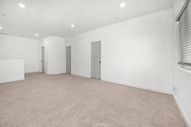 a view of a room with rack on the wall