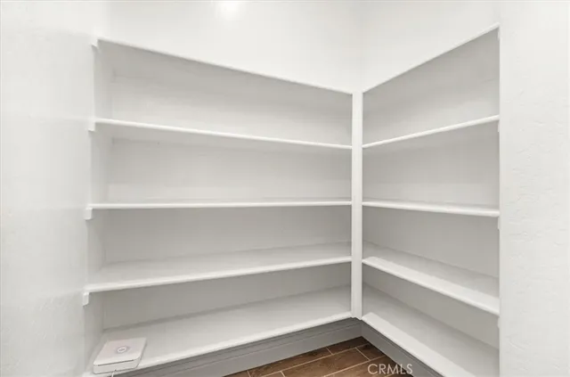 a bathroom with a shower sink and mirror