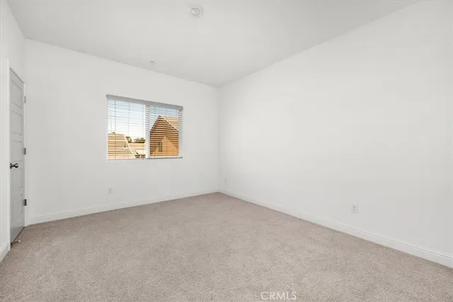 an aerial view of houses with outdoor space