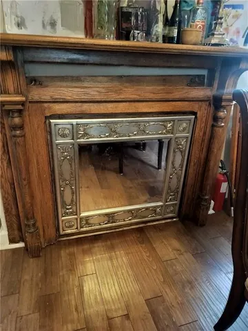 a stove top oven sitting inside of a kitchen