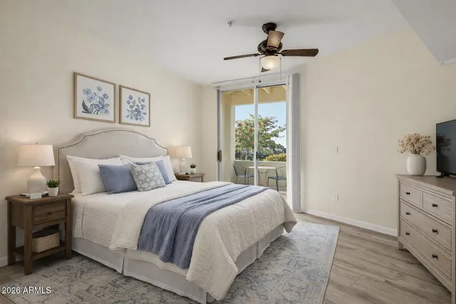 a bathroom with a shower and a sink